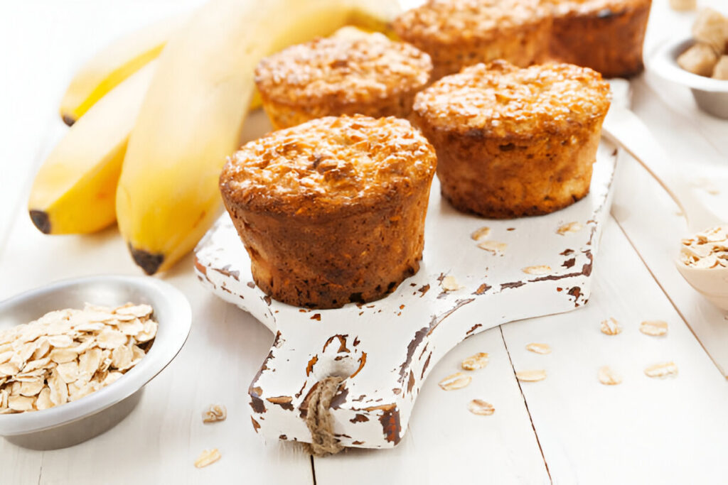 A selection of healthy muffins including gluten-free and pumpkin varieties on a colorful plate.